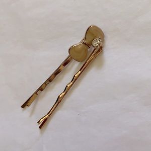 2 Cute Bobby Pins with a faux diamond jewel and a bow charm